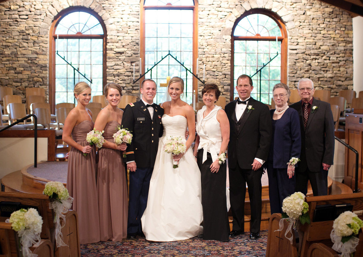 Shown from left: Sisters of the bride, Sarah and Caroline; Bridesmaids; Drew and Kate Legasse; the bride’s parents, Carol and Jim Fowler, and maternal grandparents, Jo Ann and Don Leifeste, of Gonzales. 
