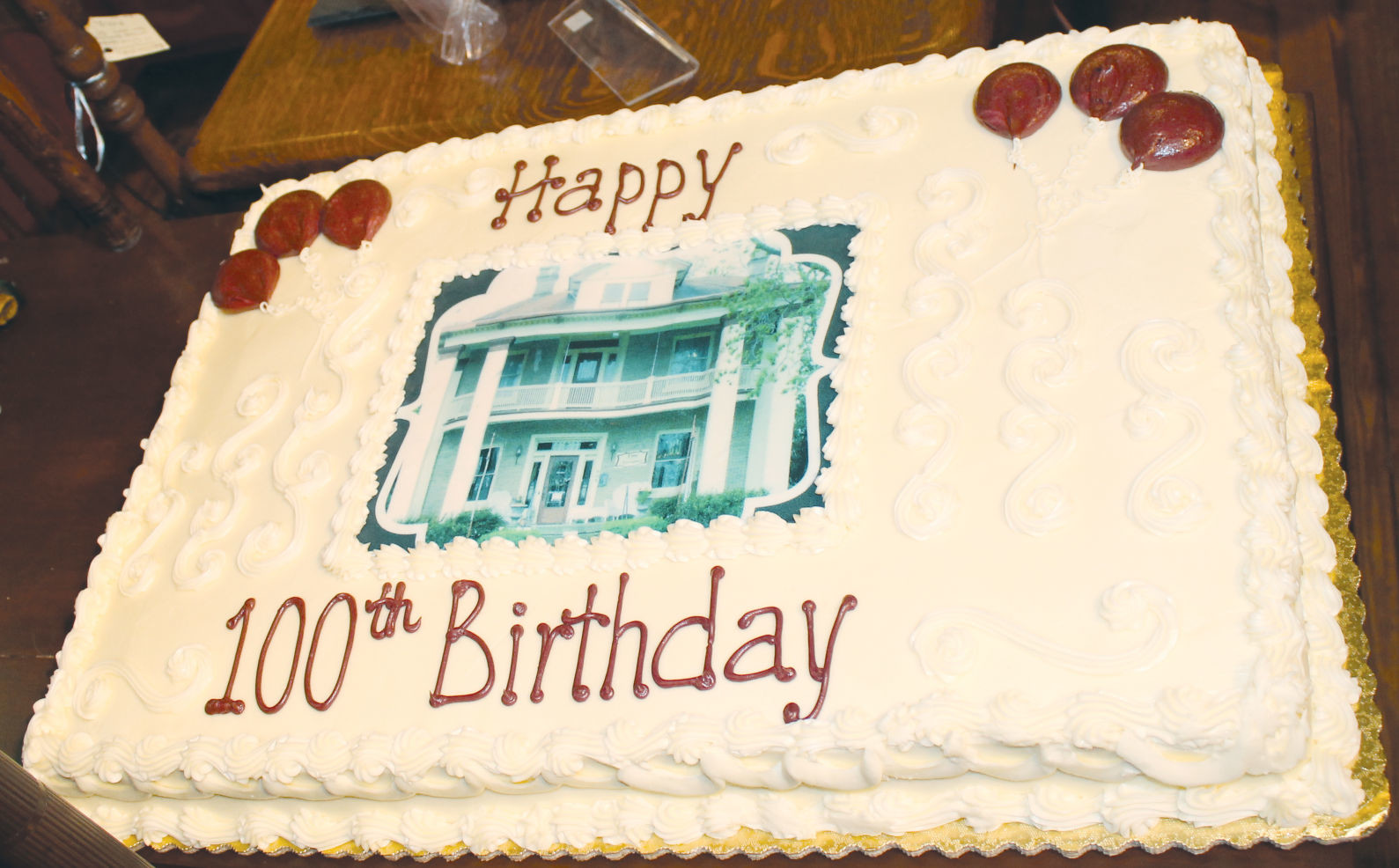 Descendants of Frank Merriman Fly celebrated the 100th anniversary with a decorative cake.