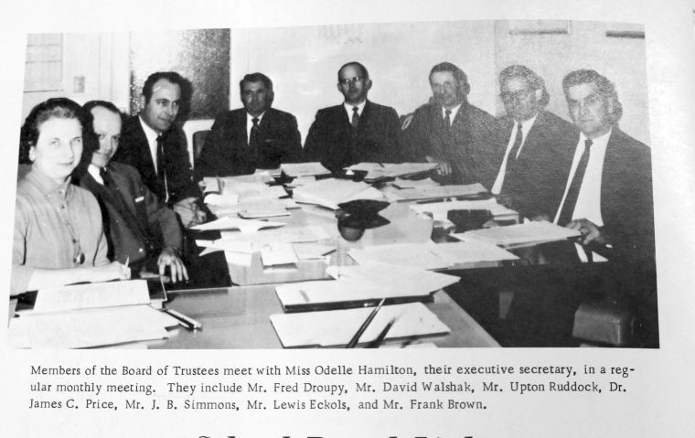 Dennis Droupy recalls former GISD Superintendent Fred Havel calling this group of school board members “the best to serve Gonzales.” Shown from left are Executive Secretary Odelle Hamilton, Fred Droupy, David Walshak, Upton Ruddock, Dr. James C. Price, J. B. Simmons, Lewis Eckols and Frank Brown. 