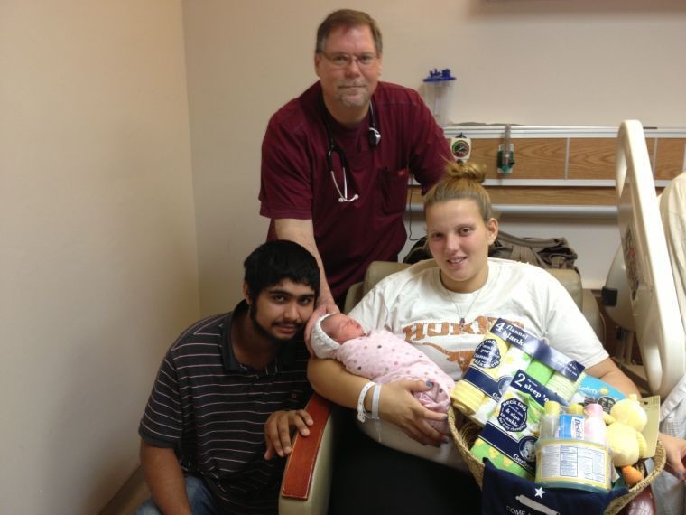 From left, father Steven Rivera, Christopher Walker, MD, mother Mikayla Wickens and baby Julianna Marie Rivera.