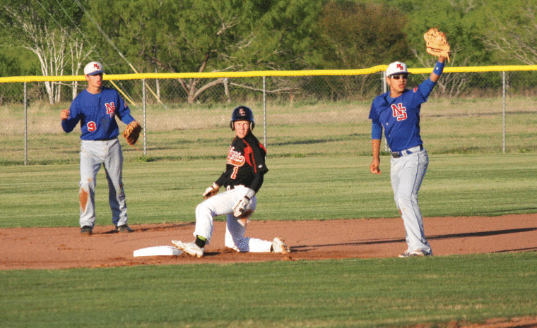 All eyes look to the umpire to confirm that Nick Pena (right) of Nixon-Smiley made the tag on the Karnes City base runner Thursday, who was called out on the attempted steal. Jared Van Auken of Nixon-Smiley is at left.