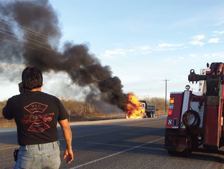 A dump truck is fully engulfed in flames shortly after 5:30 p.m. Thursday on U.S. Highway 183 about 10 miles south of Gonzales. Firefighters from Gonzales battled the blaze, which snarled traffic in the area. No one was reported injured in the fire.