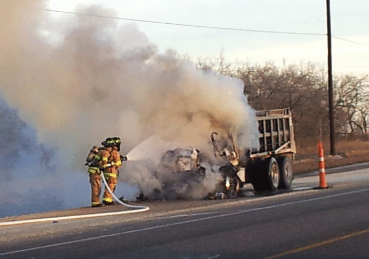 Gonzales firefighters act quickly to extinguish the blaze when a dump truck is fully engulfed in flames shortly after 5:30 p.m. Thursday on U.S. Highway 183 about 10 miles south of Gonzales. The blaze snarled traffic in the area. No one was reported injured in the fire.