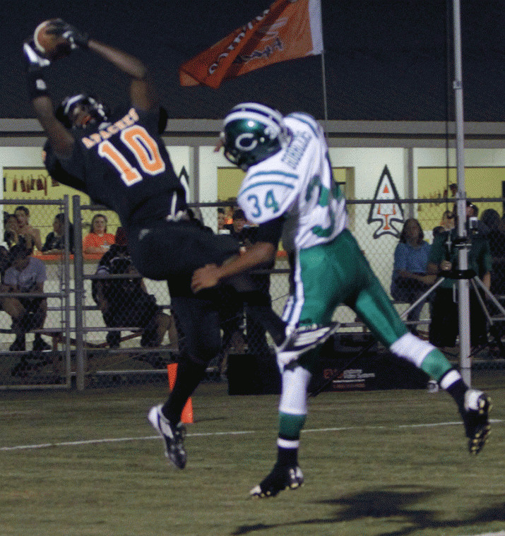 Gonzales wide receiver Darrance James (10) hauls in a touchdown pass during the Apaches’ 41-14 loss to Cuero Friday in Gonzales. James also scored on a 30-yard run on a hook-and-ladder play.
