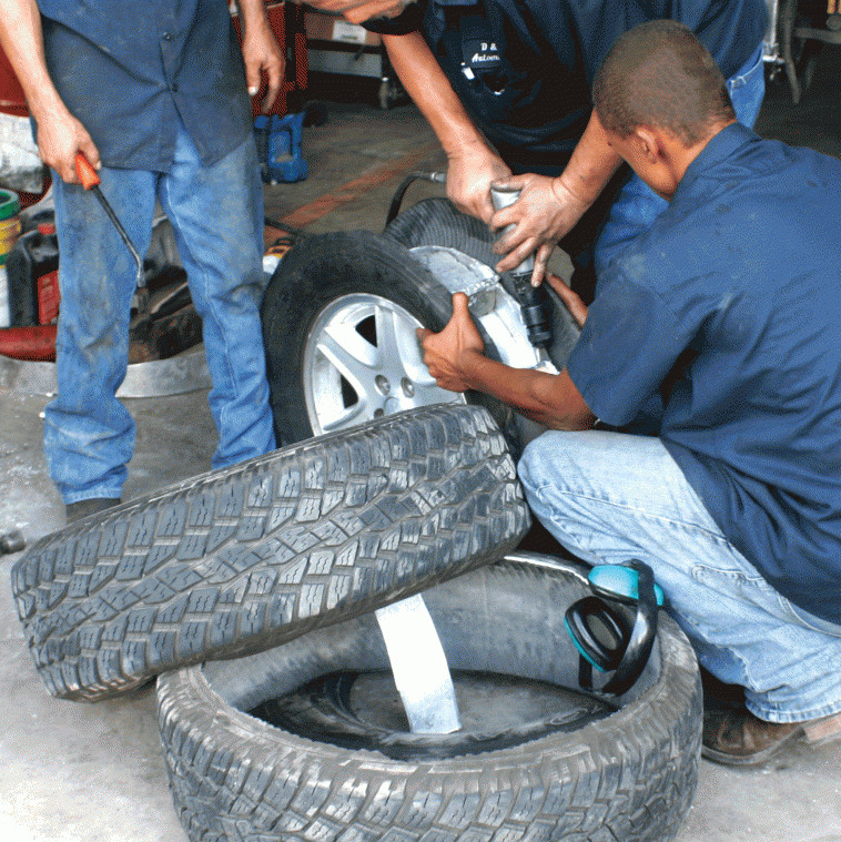 Workers removed the tires from a vehicle and revealed 33 packages of crystal meth which were being smuggled through Texas.