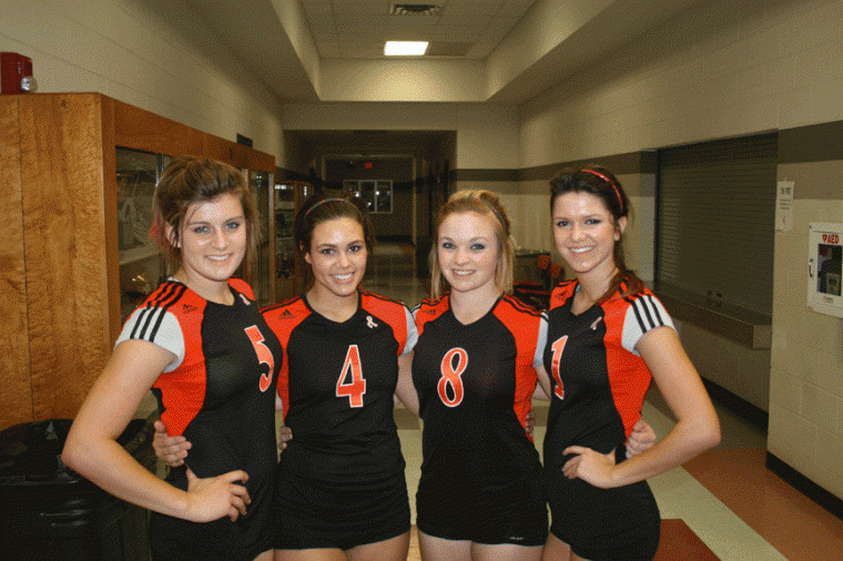 Gonzales volleyball players (from left) Danyelle Glass, Morgan Simper, Cassidy LaFleur and Kendal Fougeret cheer the Apaches to victory on Friday nights.