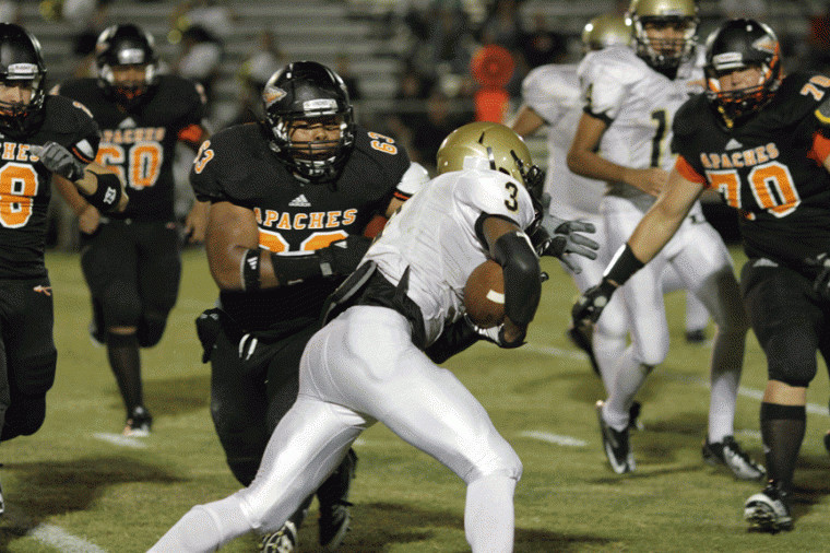 Gonzales defensive tackle Zac Perez-Clack (63) prepares to maul an opposing ball carrier during a recent game as teammates Tyler Filla (70), Jordan Johnson (60) and Chris Garcia (28) converge on the play. The Apaches rolled over College Station, 47-6, Friday at Apache Field.