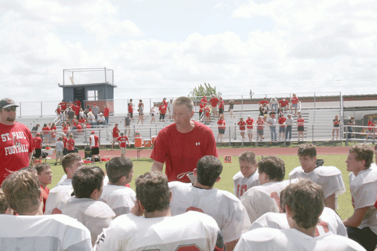 St. Paul football coach Jake Wachsmuth addresses his team after its preseason scrimmage at Nixon-Smiley Aug. 18. The Cardinals host Pettus at 7:30 p.m. today at Comanche Stadium in Shiner.
