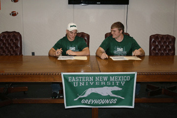 Former Gonzales football players Landon Lock, left, and Cody
Jurek signed National Letters of Intent to play at Eastern New
Mexico at a signing ceremony Wednesday at the Gonzales High School
fiedhouse.