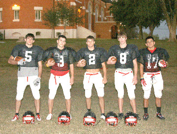 Martin Kennedy, left, Brett Hodges, Adam Hollenbach, Dakota
Kresta and Justin Natal all have key roles in the St. Paul offense,
which has accounted for more than 4,700 yards — 2,400 rushing,
2,300 passing — of total offense. The Cardinals switched from the
I-formation to the spread this season, but the end result is the
same as they’re back in the TAPPS Division IV state championship
game. St. Paul faces Sacred Heart at 6 p.m. Saturday at Wildcat
Stadium in Temple.