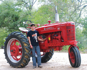Kyle Day and his restored 1948 International Harvester Farmall M
tractor