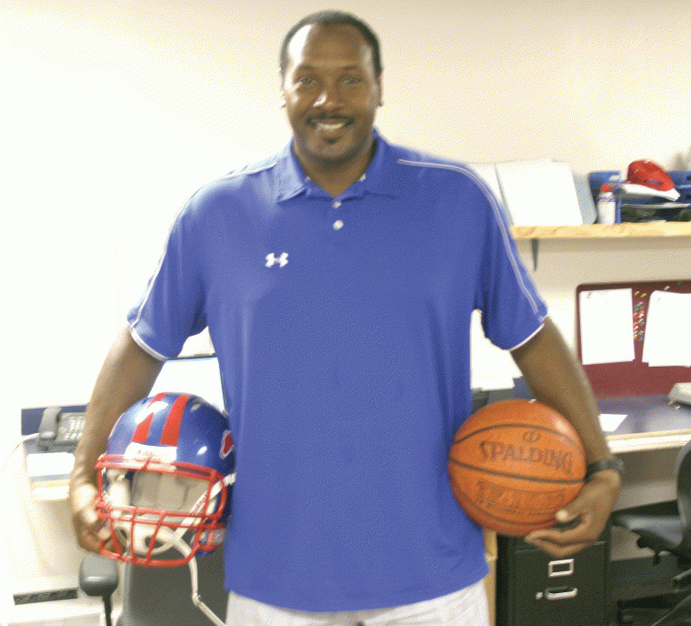 Most young men who grow up playing basketball dream of one day
taking their talents to the professional level. Carlton McKinney
played professional basketball for 10 years. But his dream was to
coach high school basketball. He now does that, as well as coaching
football, at his alma mater in Nixon.