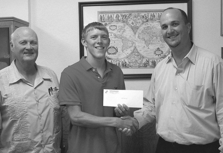 Clarence Littlefield, vice president of Southwest Engineers;
Carson Washington, scholarship recipient; and John Littlefield,
president of Southwest Engineers.