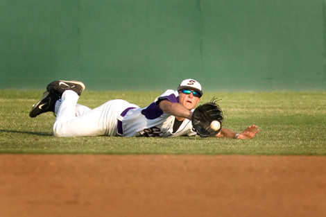 Shiner’s Blaine Caka makes a diving catch to rob Johnson’s City of a hit in game two of the Class 1A Region IV Finals series in San Antonio Friday. Caka and the Comanches won the game 11-4 but fell to the Eagles in the series, 2-1.