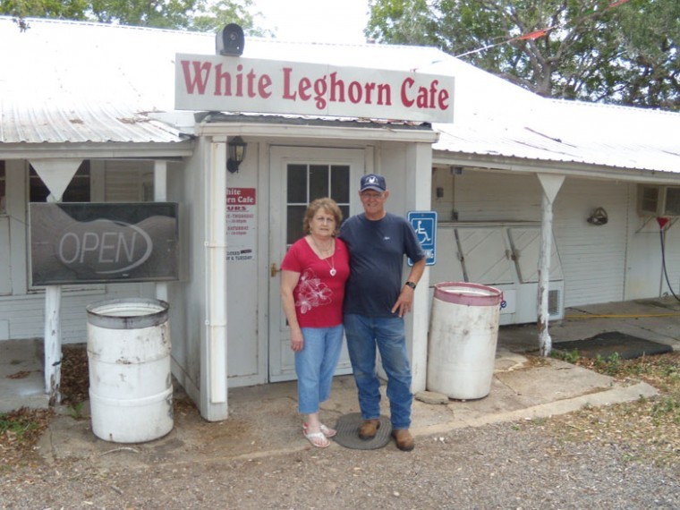James and Ruby Dickerson, owners of the White Leghorn Cafe, pose in front of their legendary restaurant.