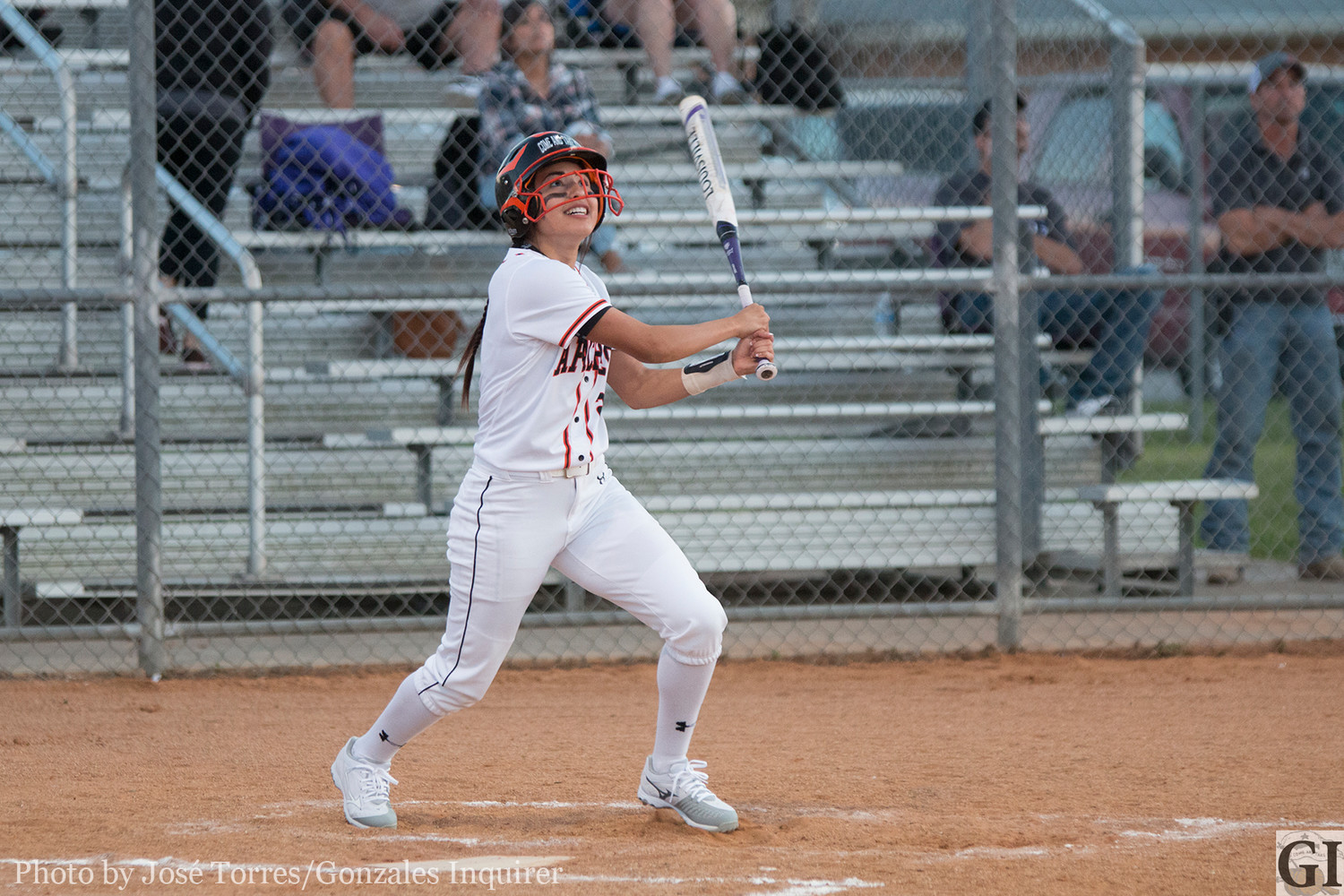Haley Garza (2) lets one fly in Gonzales' 14-0 loss against Navarro.