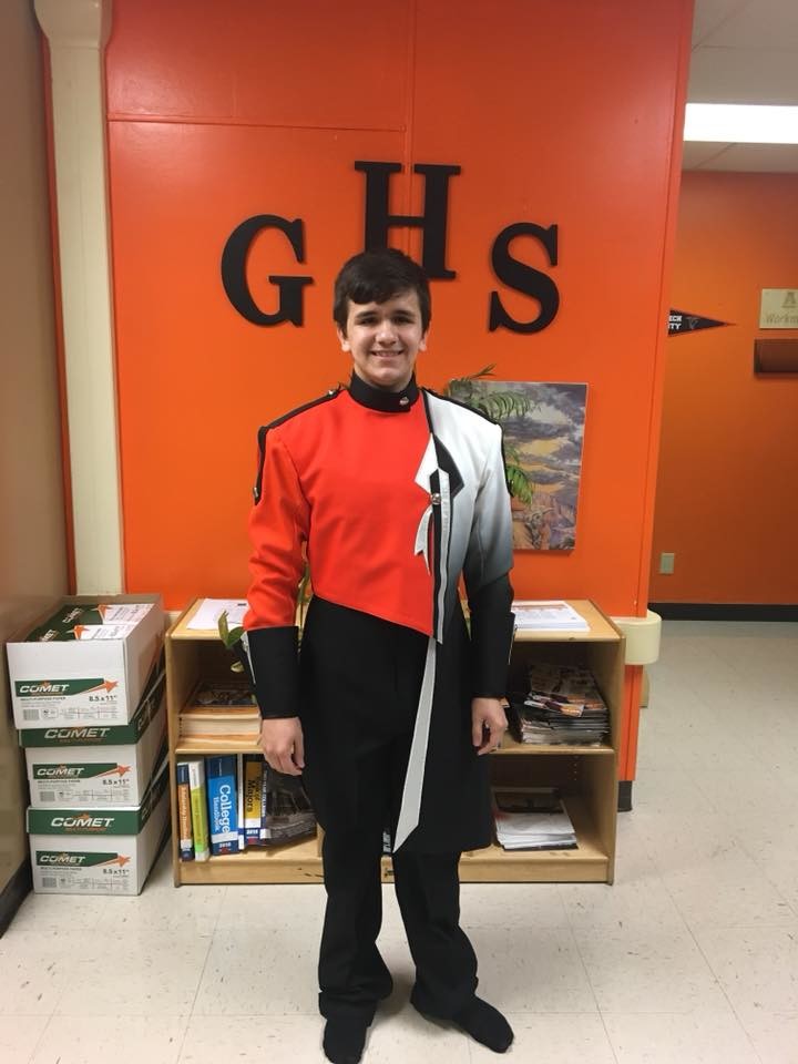 Rising senior Tyler Barfield models the new Mighty Apache Band uniform for the 2018-19 school year. The band will be hosting fundraisers throughout the summer to help pay for the new threads.