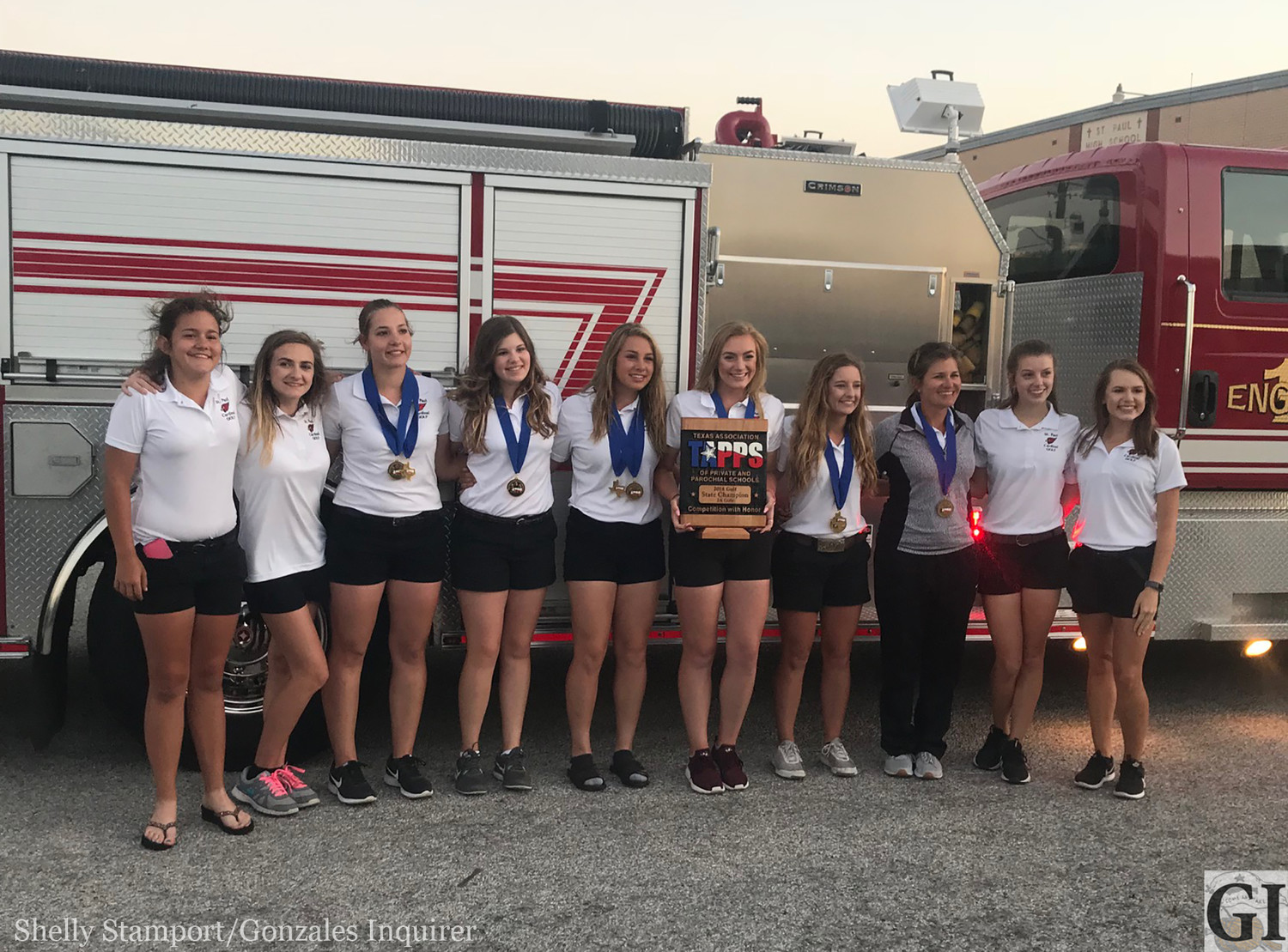 Shiner celebrated the Lady Cardinals state championship Tuesday night with the fire truck carrying St. Paul’s girls golf team drove through town. The Lady Cardinals beat the second place team by a whopping 43 strokes.