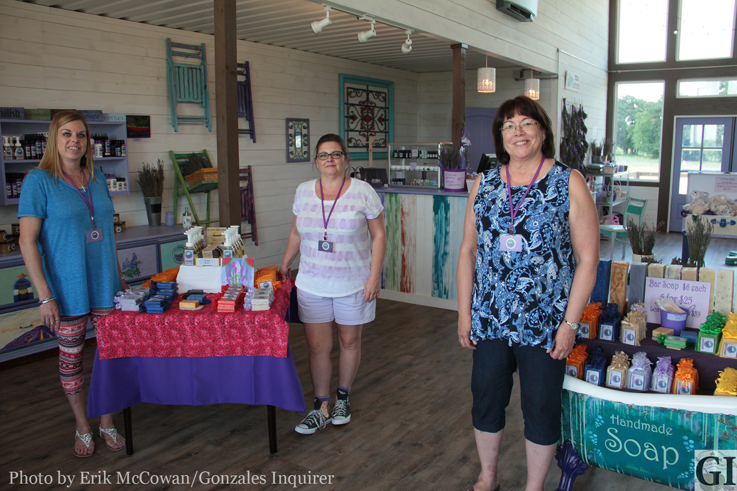 From left, Tina Rader, Princess Ferrell, and owner Erin Leavitt take a stroll around the new establishment that has everything lavender from soaps and shampoo to powders and beard oil.