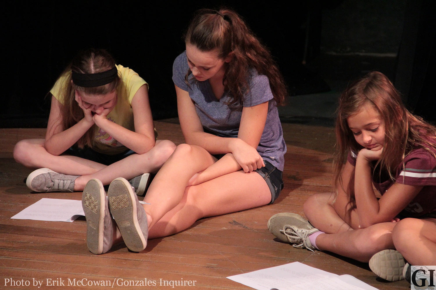 Crystal stage veteran Danni Blair, center, sits with some young campers as she assists with their lines.