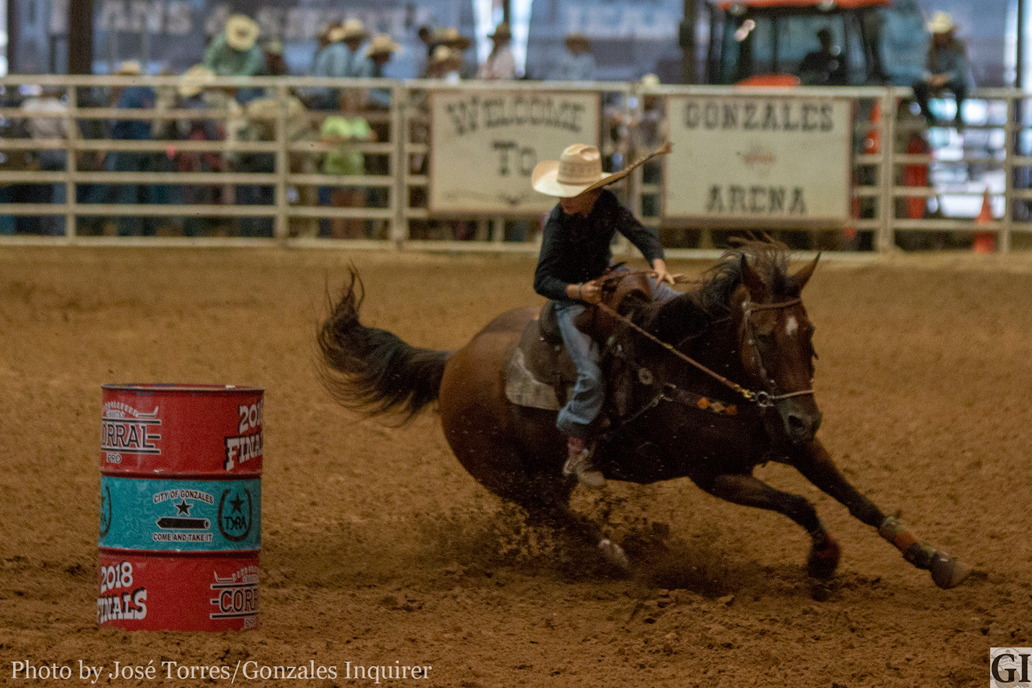 Orange Grove’s Tylar Ellis rounds the barrels during her rodeo performance on Tuesday night.