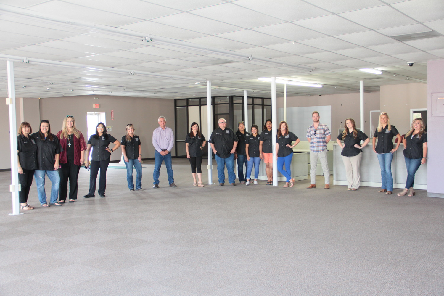 Members of the Gonzales Chamber of Commerce and Agriculture board of directors stand inside their future home downtown. The spacious building is on Texas Heroes Square across from the flag pole in the former GVEC building, which should make it an easy-to-find location for visitors.