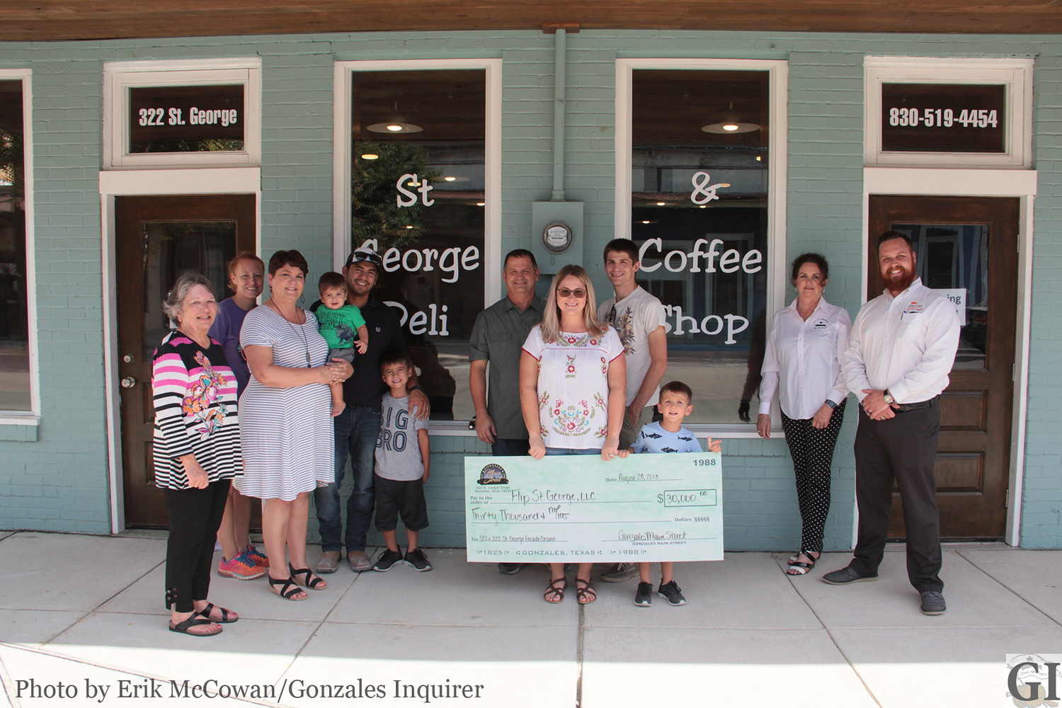 Members from Gonzales Main Street and the Gonzales Economic Development Corporation joined Jacob and Manda Leal and Linda and Stuart Frazier in front of their new storefront at 318 St. George Street, which is the latest recipient of a $30,000 small business grant to help revitalize the appearance of the building.