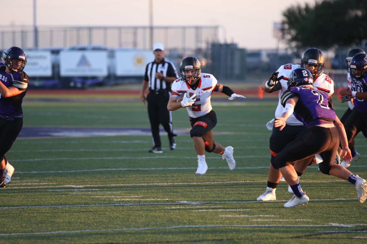 Seth Gibson finds an opening via the Apaches offensive linemen blocks.