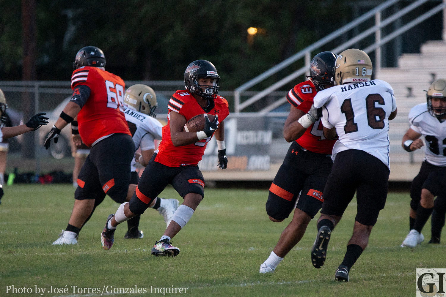 Jared Esparza(43) plays lead block for running back James Martinez (13). Martinez finished the night with eight rushes for 48 yards and two touchdowns.