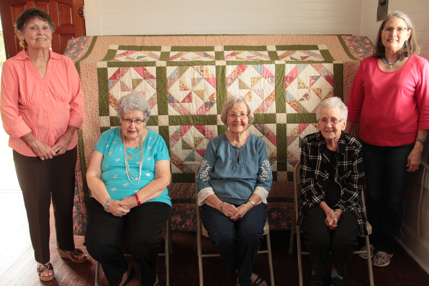 The Happy Quilters are, from left, Margie Rice, Ruth Newberry, Charlene Anderson, Janyce Littlefield, and Terri Porter. You can catch them and their handmade quilt at the Leesville Country Fair on Oct. 13.