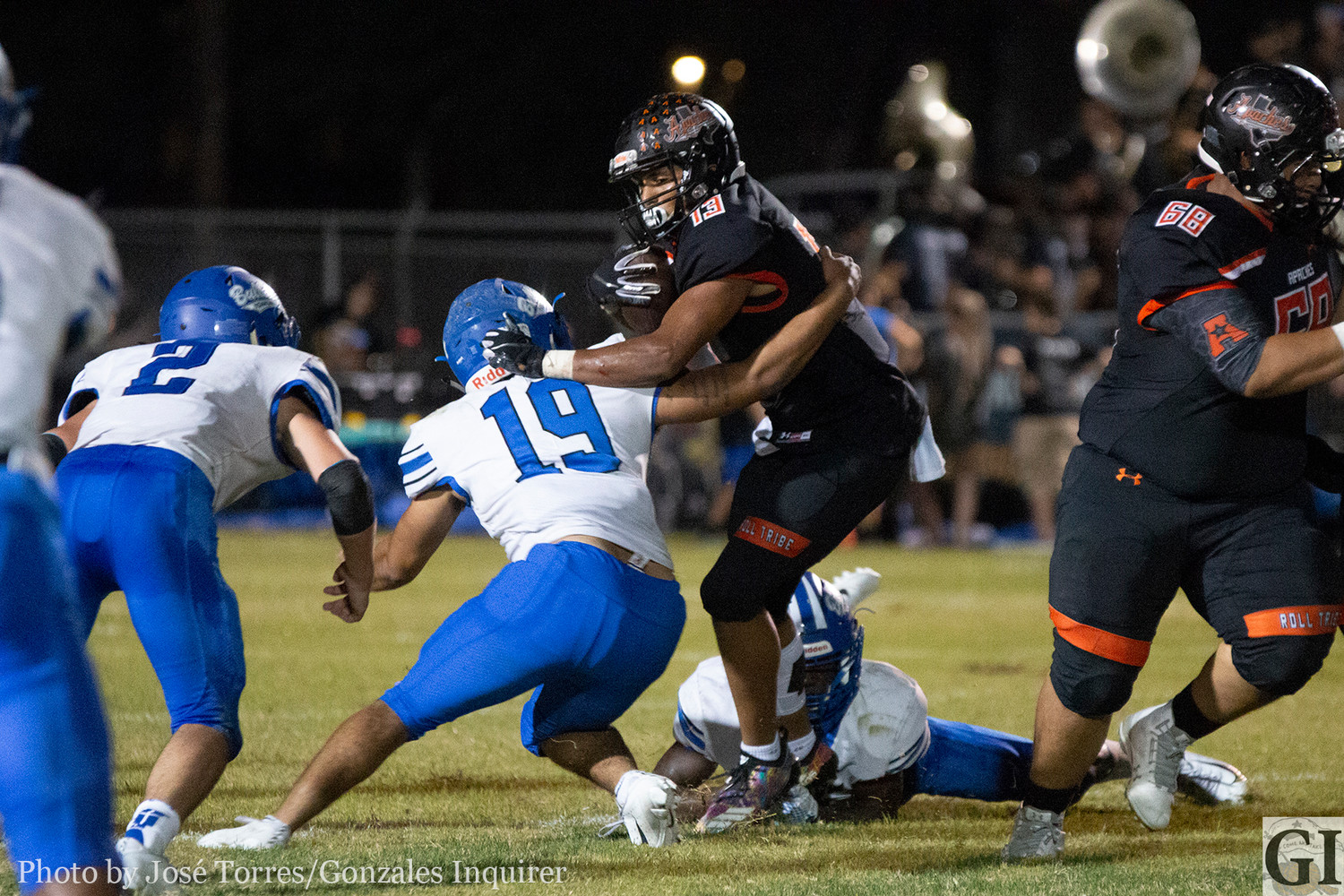 James Martinez (13) tries to break a tackle in Gonzales' 33-14 loss against Yoakum on Thursday night at Apache Field.