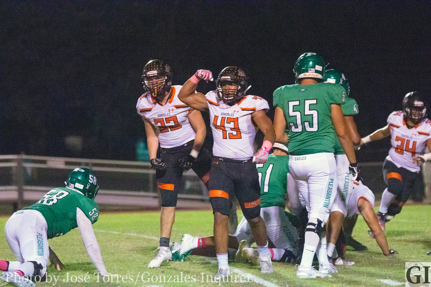 Jared Esparza (43) flexes after an Apache defensive stop in Gonzales' 37-36 overtime win over Pleasanton.