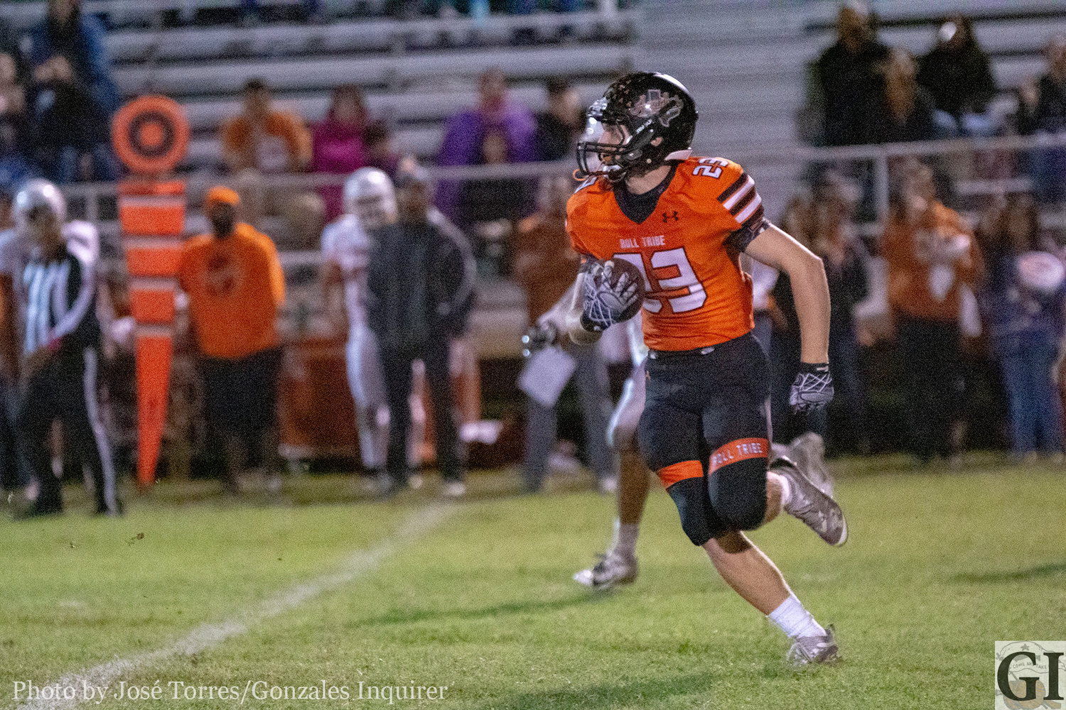 Heath Henke (23) looks for an opening as he returns an interception into Beeville territory in Gonzales' 24-13 victory. Henke would end the night with two interceptions.