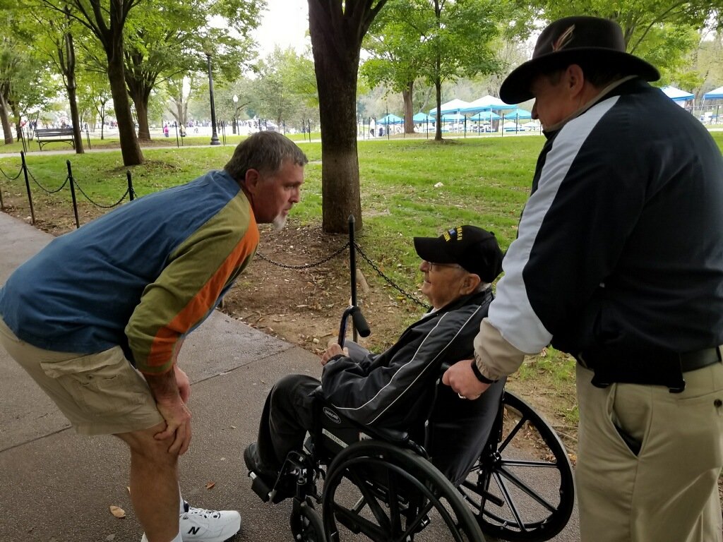 A stranger stops to thank William Berger for his service in Vietnam.