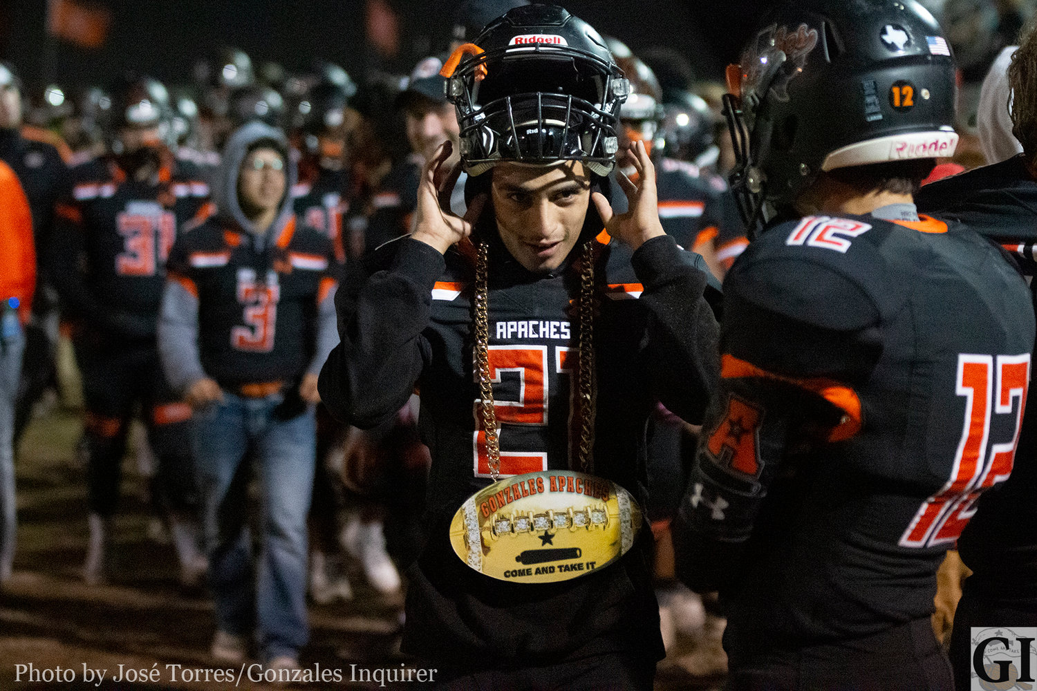 The turnover chain had to be passed around a bit as the Apaches defense played tough against the Boerne Greyhounds. Domingo Garcia (21) let's his chain hang low in Gonzales' 35-28 win.