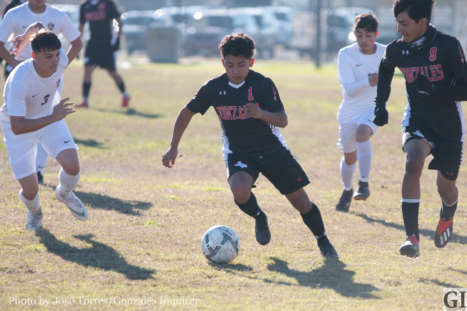 Anthony Veliz (1) dribbles past the defense in Gonzales’ 2-0 victory over La Grange on Tuesday. Veliz accounted for five regulation goals in the tournament and one penalty kick goal against Canyon Lake in Gonzales’ inaugural boys soccer tournament last weekend.