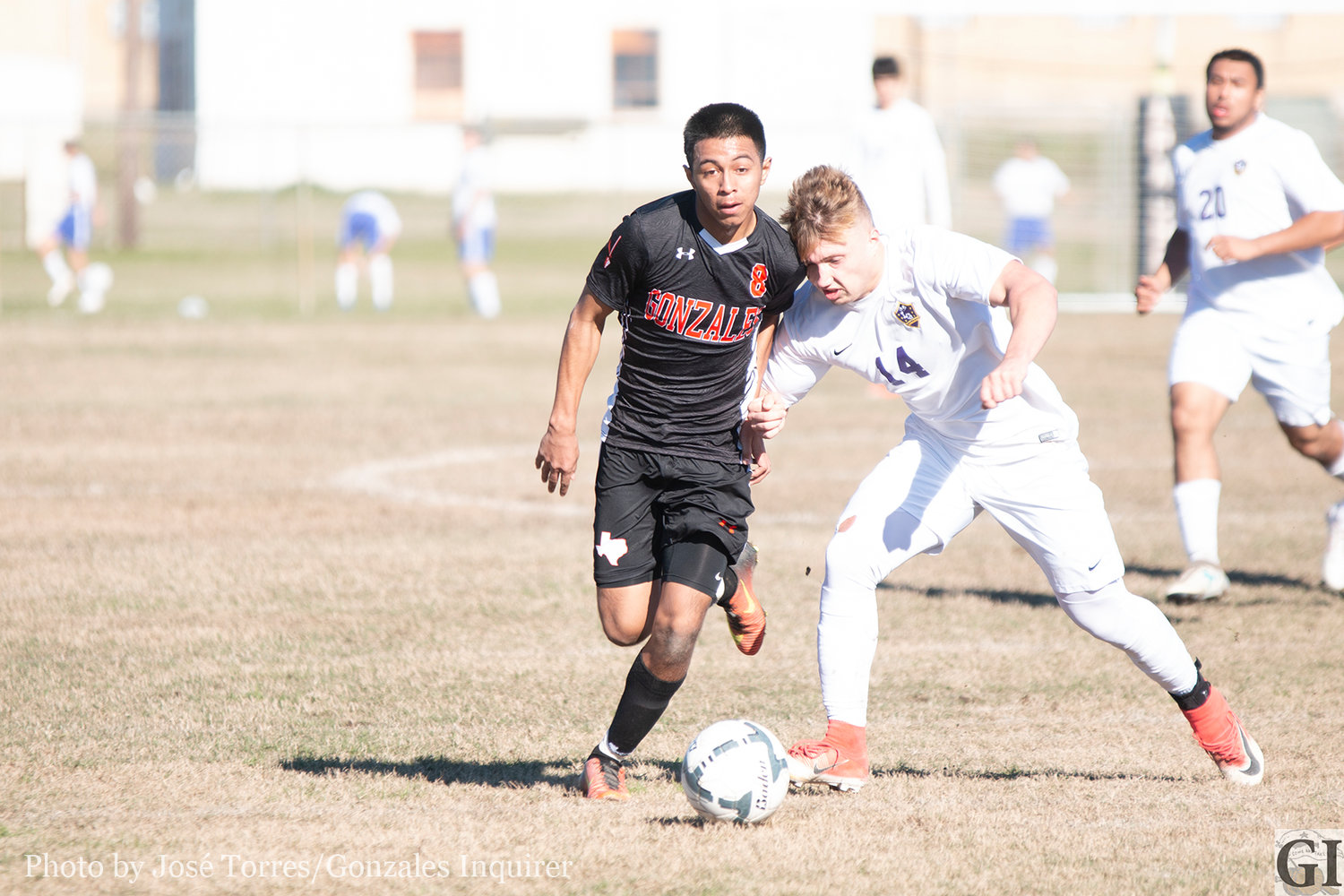 Antonio Hernandez (8) fights for the ball.
