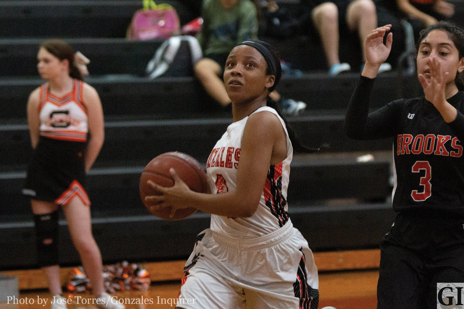 Senior Lady Apache Chelsie Hastings (4) goes for a layup in Gonzales’ 66-11 blowout win against San Antonio Brooks Academy on Tuesday. Hastings finished the night with eight points.