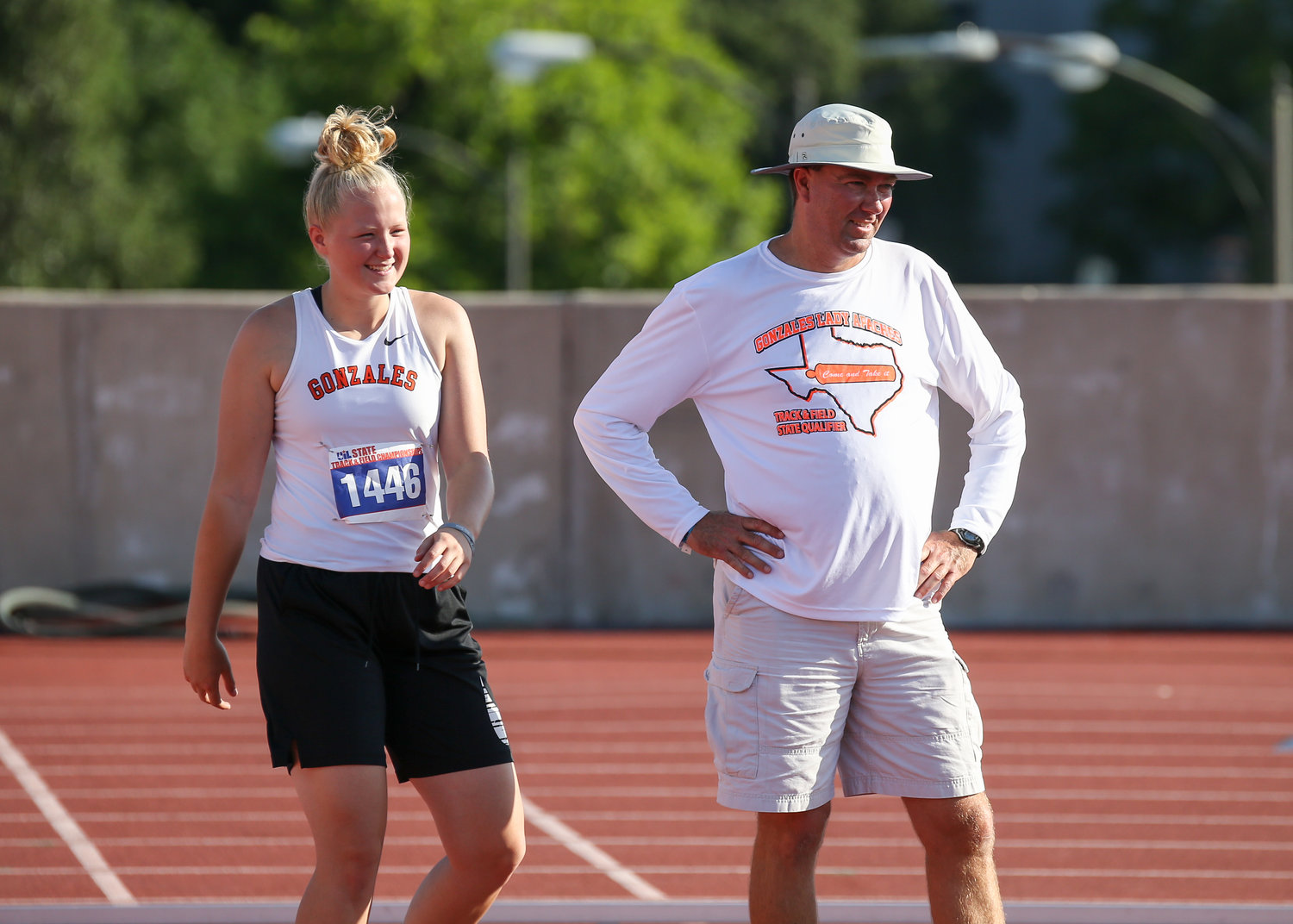 Devon Williams of Gonzales High School competes in the Class 4A girls shot put event at the UIL State Track and Field Meet at Mike A. Myers Stadium in Austin, Texas on Friday, May 11, 2018. Head Coach Cully Doyle (pictured on the right) has expectations of getting back to the state meet.