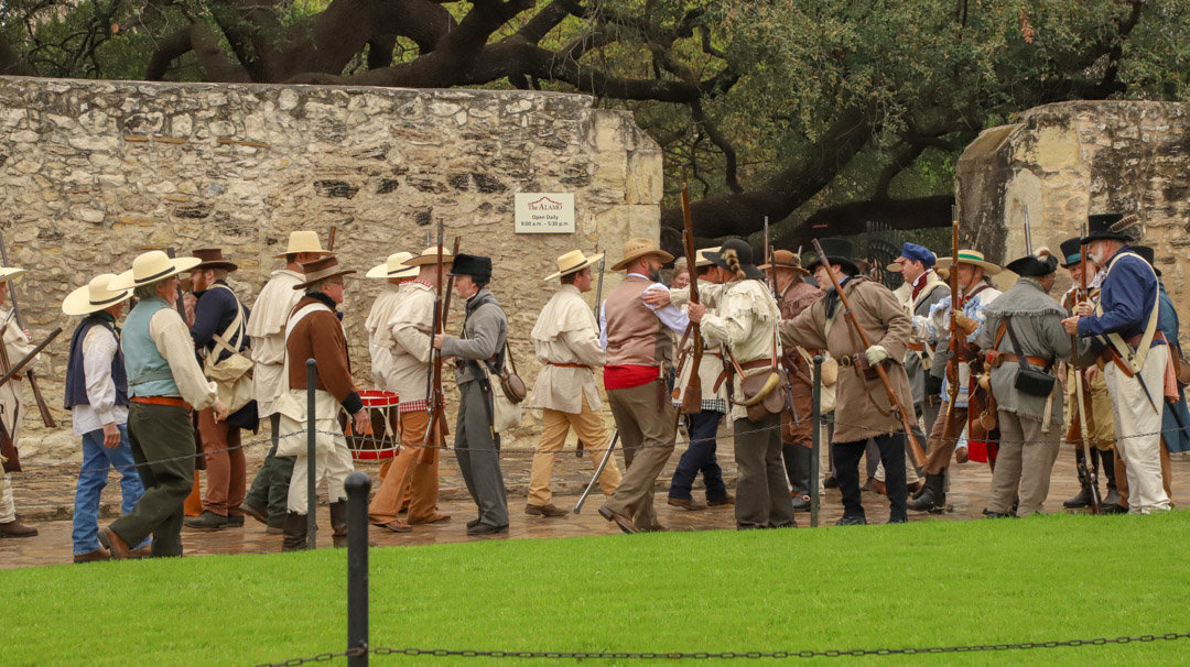 Travis’ re-enactors greeting the Gonzales men as they prepare to enter and defend the Alamo.