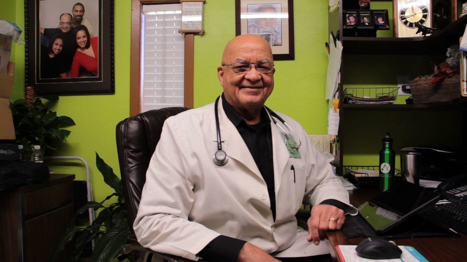 CUTLINE: Dr. Garth O. Vaz takes a break in his busy, down-home office to chat about some of the exciting things going on in his clinic.