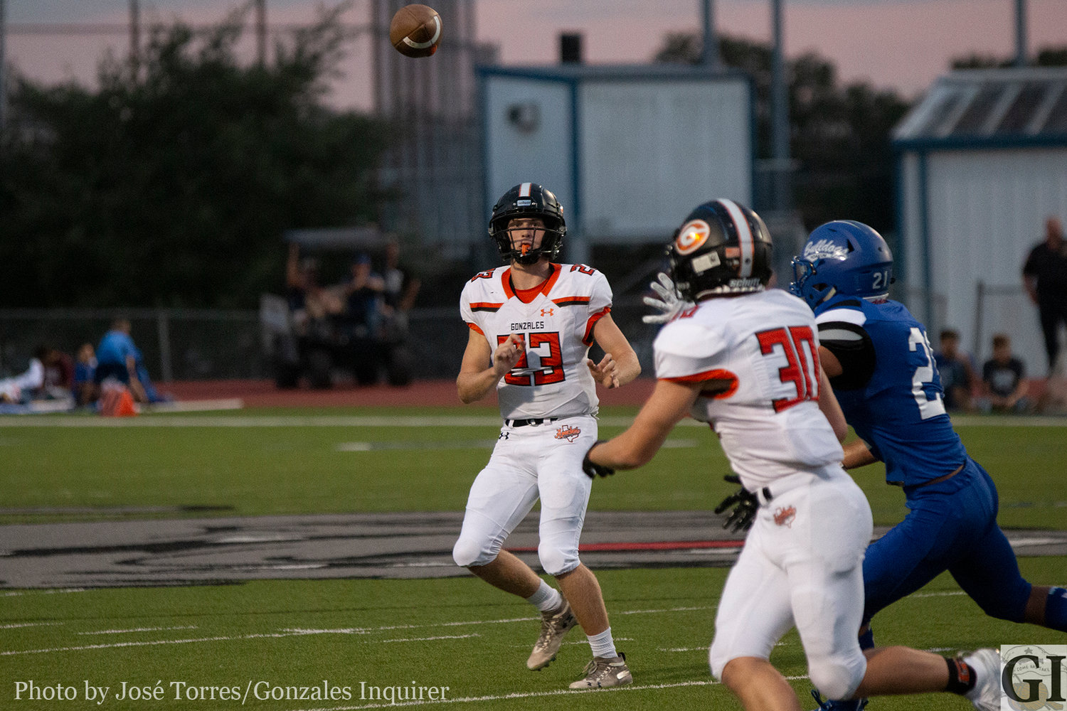 Quarterback Heath Henke (23) finds Jared Cook (30) off a play-action pass early in the first half. The Apaches would win 27-25 against the Yoakum Bulldogs.