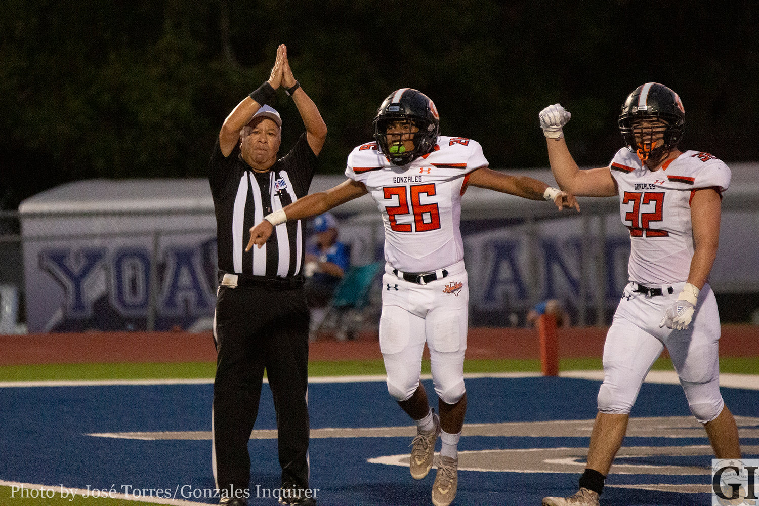 Aaron Guerrero and Diego Diaz de Leon celebrate a safety in the first half of Gonzales' 27-25 win over Yoakum.