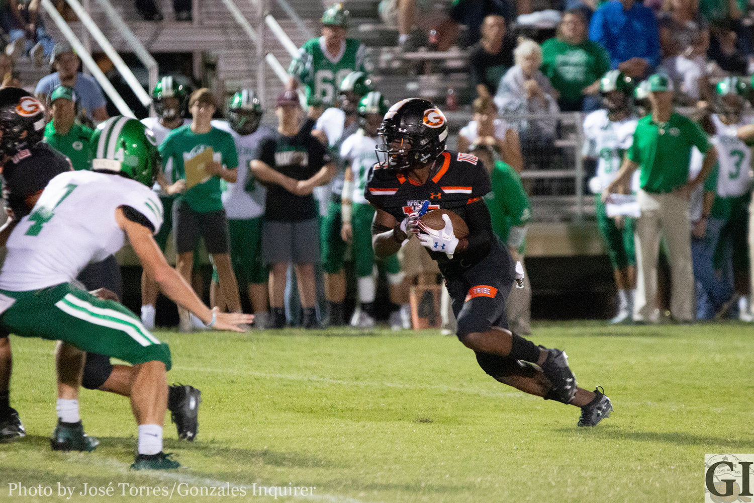 Arbreyon Dora (10) scoots his way to the end zone as the Apaches knock off Cuero 21-20. Dora scored twice in the one-point victory.