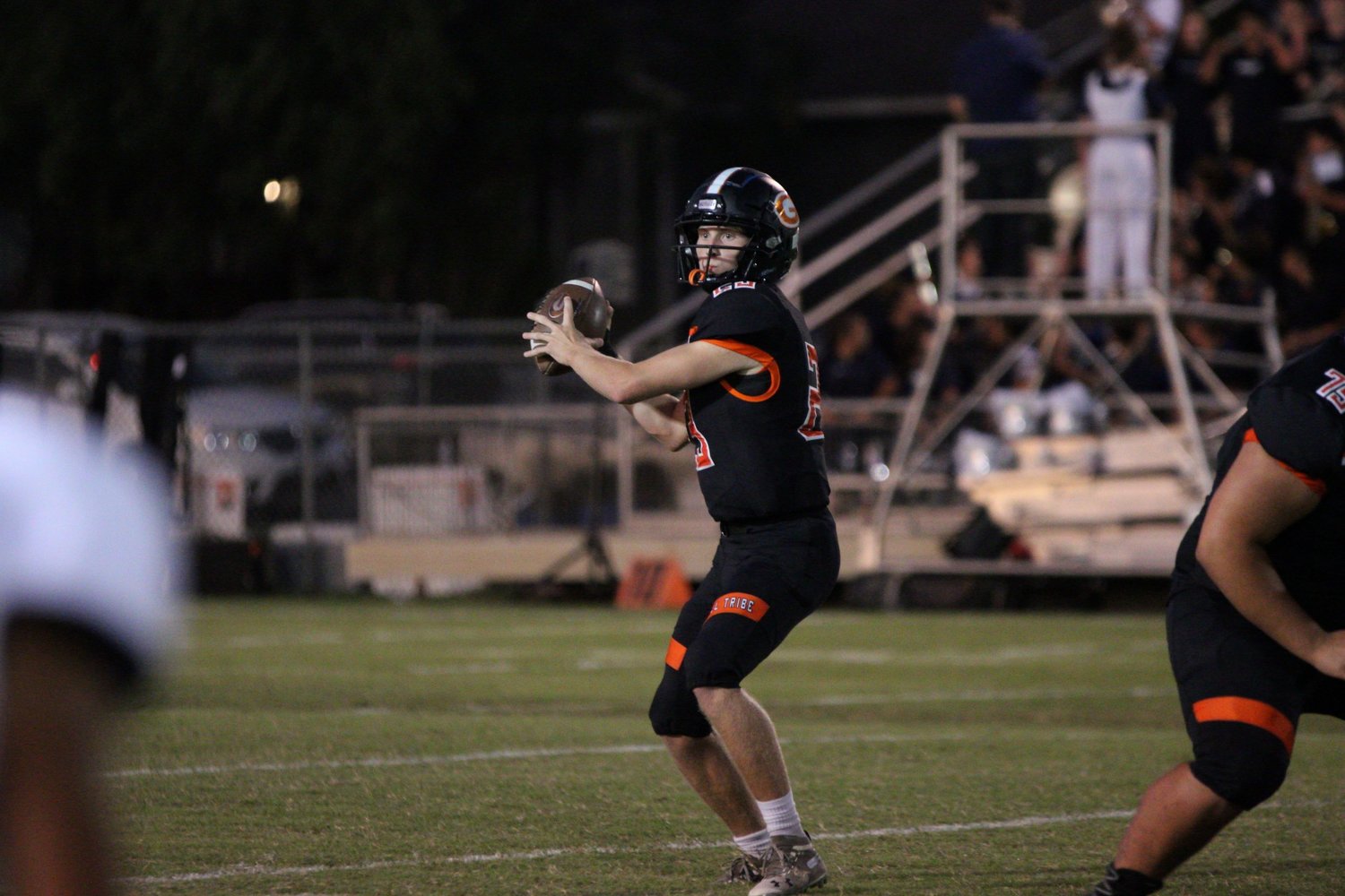 Heath Henke looks for an opening on a screen pass in Gonzales' 43-21 victory.