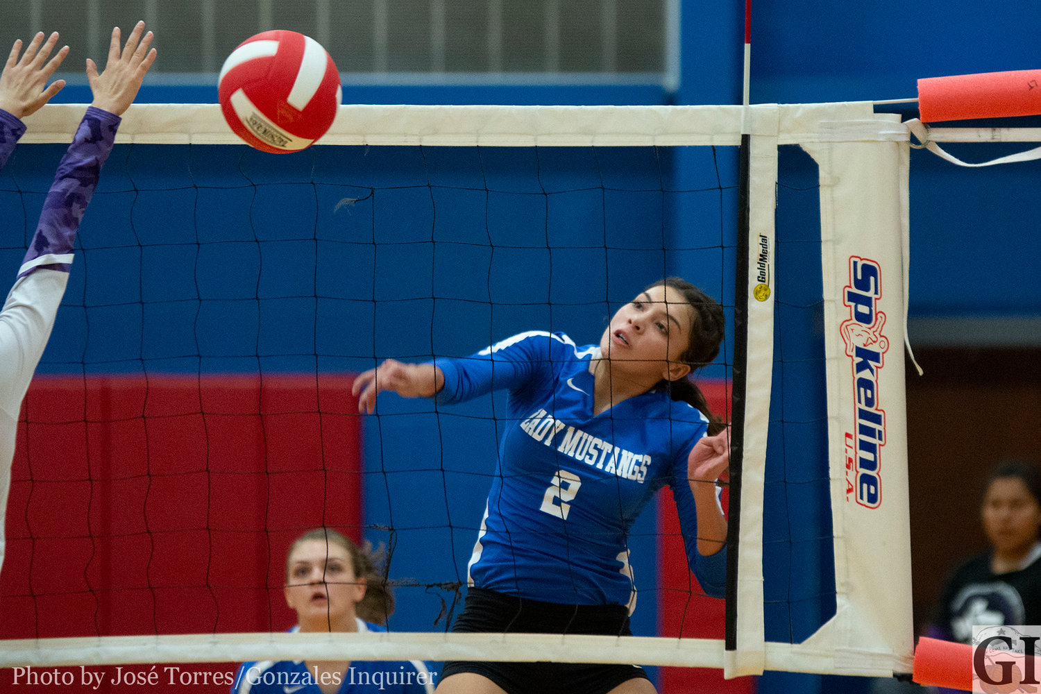 Autumn Rodriguez (2) knocks down a kill in Nixon-Smiley’s four-set loss to Stockdale.