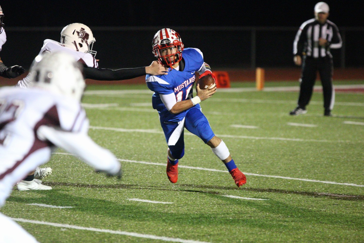 Mario Ponce (15) breaks away for a rush in Nixon-Smiley's 42-14 defeat on Thursday.