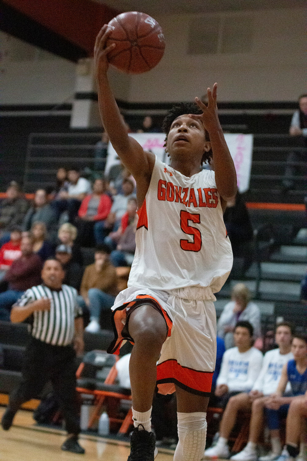 Jaiahius Goode (5) goes up for a lay up. He had seven points Tuesday against Bandera.