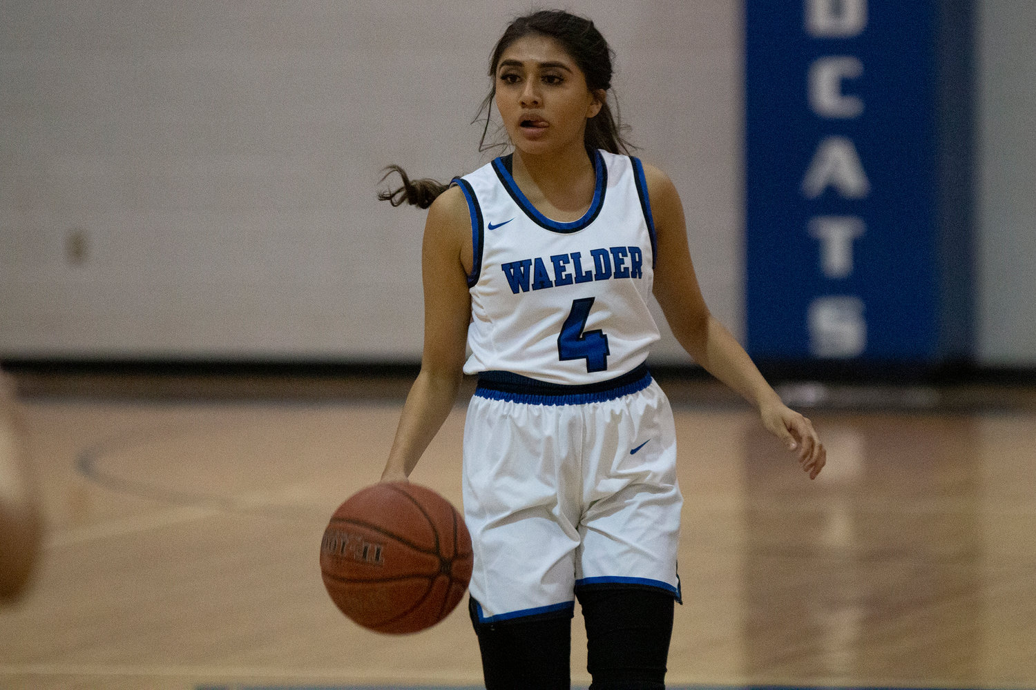 Maely Bracamontes (4) looks for an opening in Waelder’s loss against Dime Box last Friday.