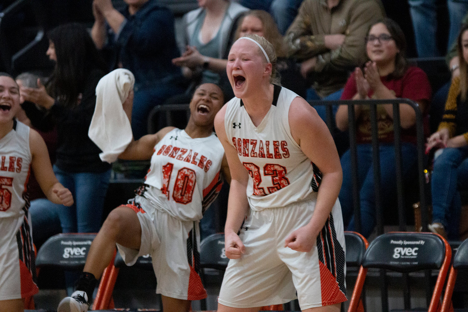 Devon Williams (23) celebrates a shot being made by her teammates on the court in Gonzales’ 47-19 victory over Pleasanton last Friday. The Lady Apaches open playoffs with a bi-district matchup against Hondo next Tuesday, Feb. 18 at Floresville. Tipoff is scheduled for 7 p.m.